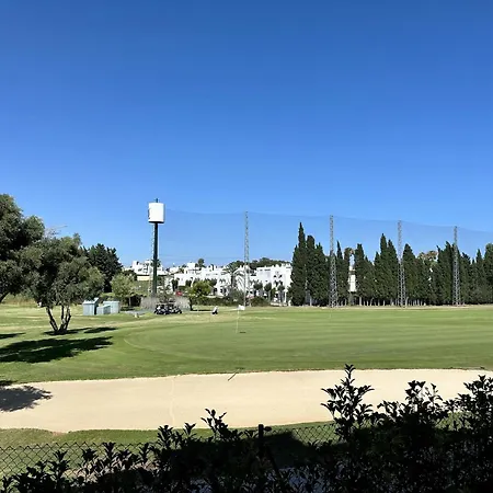 Blue House In Guadalmina Baja, With A Large Terrace Overlooking The Golf